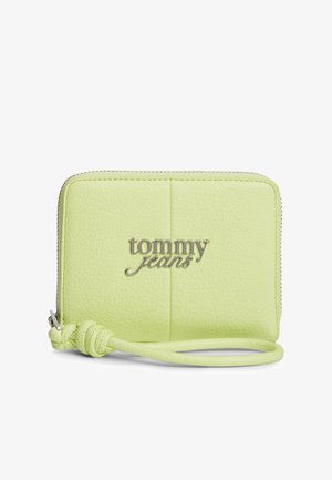 Heleroheline tekstuuriga nahast randmepaelaga rahakott hõbedase "tommy jeans" logoga ja tõmblukuga sulguriga.