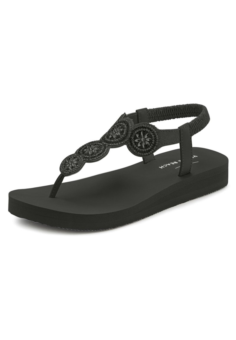 Sandalo infradito nero con suola piatta, dotato di una cintura testurizzata decorata con accenti circolari e motivi floreali. Realizzato in materiale gommoso.