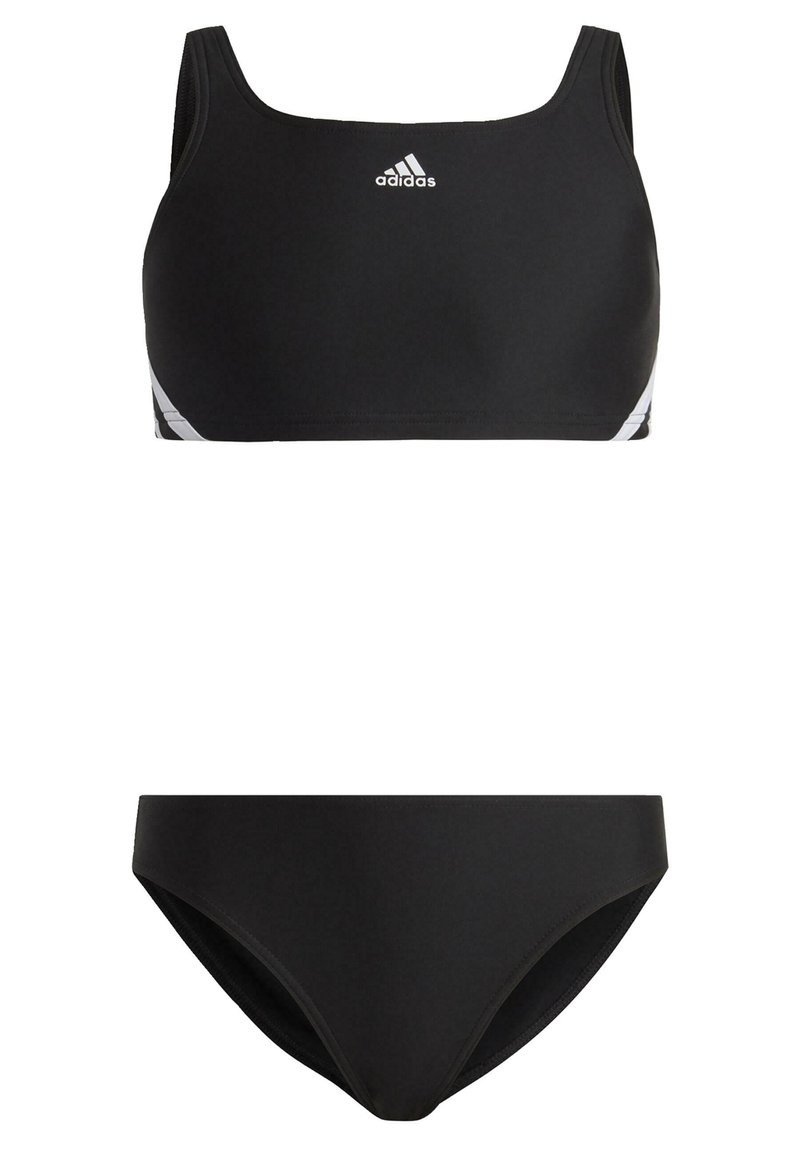 Costume da bagno a due pezzi nero con top in stile reggiseno sportivo a scollo quadrato e strisce bianche a contrasto, abbinato a slip bikini semplici.