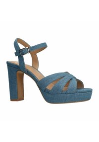 Sandali platform in denim blu con cinturini incrociati, fibbia alla caviglia e tacco chunky, caratterizzati da una texture liscia e punta arrotondata.