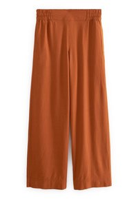 Pantalons larges en terracotta, dotés d'une taille élastique. Fabriqués en tissu léger avec une texture lisse et des ourlets soignés.