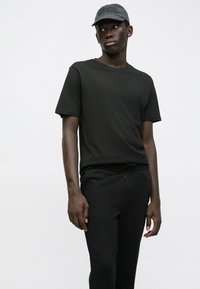 Jack & Jones JJIGORDON JJSHARK - Donji dijelovi trenirke - black