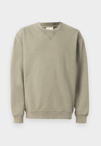 Sélectionné, tea leaf