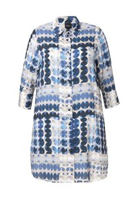 Robe chemise à manches longues boutonnée avec motifs géométriques en forme de cercles bleus et blancs et col pointu.