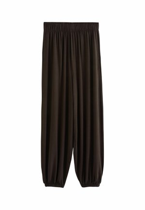 Weit geschnittene schwarze Hose mit elastischem Bund und elastischen Bündchen vor weißem Hintergrund.