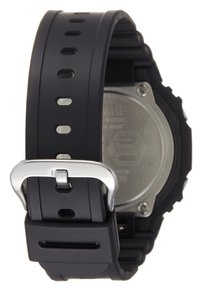 Black silicone watch band with multiple ventilation holes, silver metal buckle, and a textured black watch casing visible in the background.