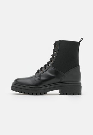 Bottines à plateau - black