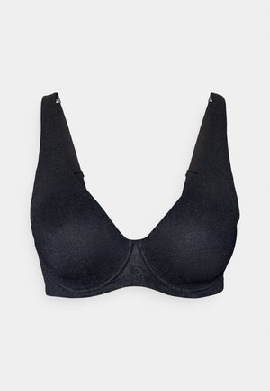 Soutien-gorge sans fil noir avec un design structuré et lisse, en tissu texturé et avec des bretelles larges pour un meilleur maintien. Encolure en V avec des motifs subtils.