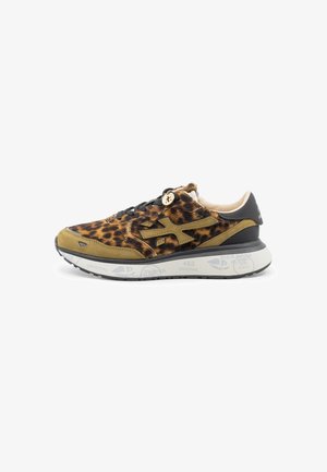 Leopard print sneaker in brown and black faux fur, with olive green suede accents, black leather heel, and white textured rubber sole.
