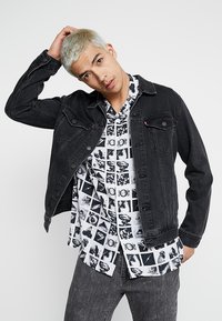 Levi's® THE TRUCKER JACKET - Casaco de ganga - liquorice trucker