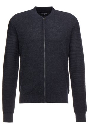 Gilet en tricot bleu marine avec un col rond et des manches longues, doté d'une fermeture éclair à l'avant et d'un ourlet et de poignets côtelés. Finition en tissu texturé.