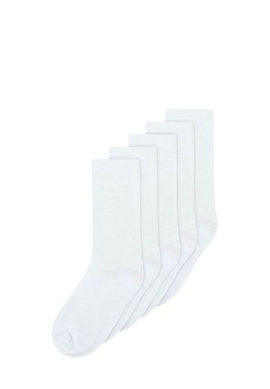 Five pairs of plain white crew-length socks arranged in a fanned-out stack on a white background.