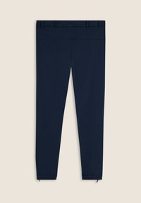 Pantalones jogger azul marino hechos de tela suave, con cintura elástica, piernas ajustadas y puños en los tobillos para un estilo ceñido.