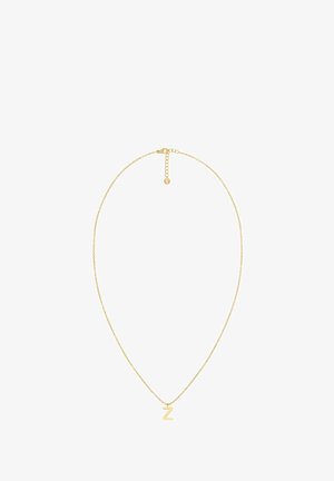 Aukso kaklo grandinėlė su plona grandine ir mažąja "z" pakabuku. Pasižymi omaro kabliuku ir reguliuojamu ilgiu su papildomomis jungtimis.