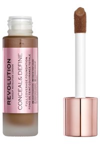 Fond de teint liquide dans un flacon en verre transparent avec une étiquette rose, surmonté d'un applicateur blanc. Teinte brun-tanné riche.