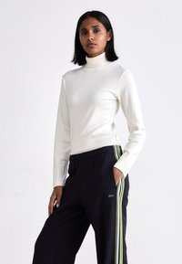 Lacoste Treniņtērpa apakšdaļas - abysm