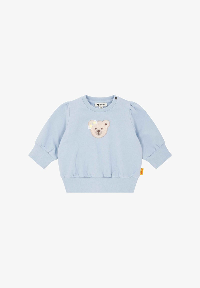 Lichtblauwe sweatshirt met pofmouwen, geribbelde zoom en een berenapplicatie op de voorkant. Beschikt over knoopdetails bij de hals. Zachte stoftextuur.