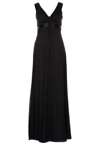 Robe maxi noire avec décolleté en V, sans manches, motif à pois argentés et ceinture en satin. Fluide jusqu'au sol avec une coupe décontractée.