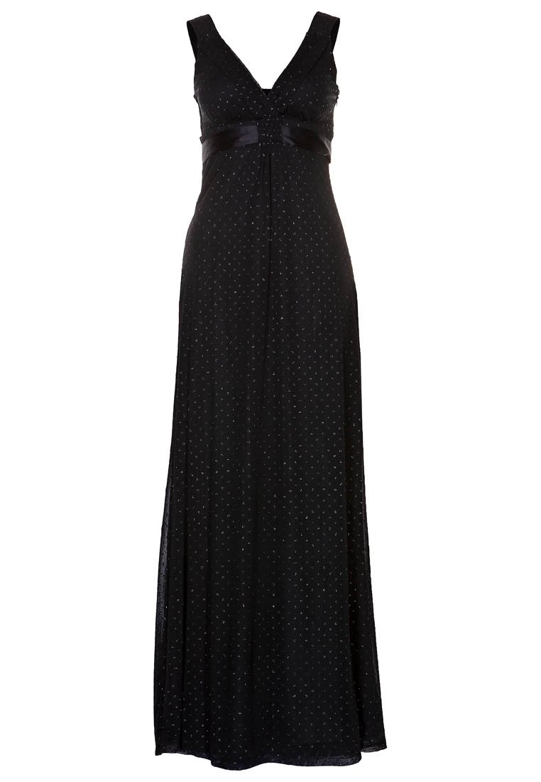 Robe maxi noire avec décolleté en V, sans manches, motif à pois argentés et ceinture en satin. Fluide jusqu'au sol avec une coupe décontractée.