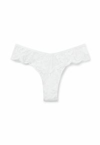 String en dentelle blanche avec motif floral, bords festonnés et texture translucide. Présente une taille étroite pour un design minimaliste.