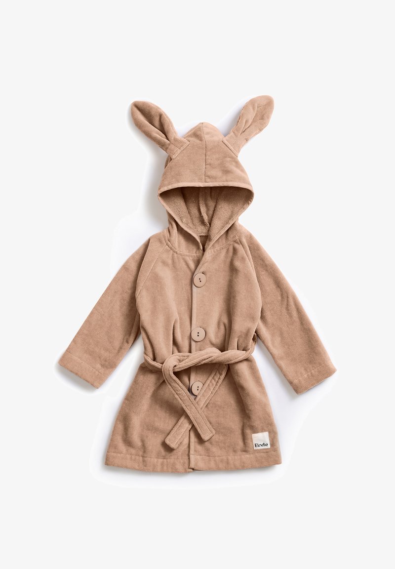 Accappatoio per bambini in morbido tessuto beige con cappuccio e orecchie da coniglio, bottoni frontali e vita regolabile con cordino. Include un piccolo etichetta del marchio.
