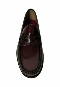 Burgundy leather loafers with a smooth finish, front stitching detail, and a rounded toe. Rectangular opening with decorative leather accents.