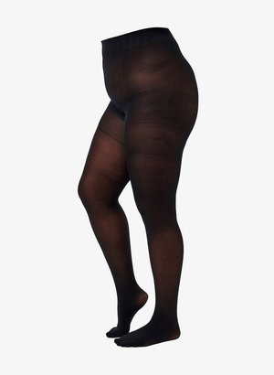 Černé neprůhledné těhotenské punčocháče zobrazené na modelce stojící s jednou nohou mírně zvednutou na bílém pozadí.