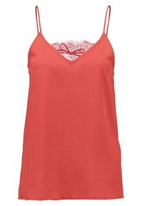 Débardeur sans manches couleur corail rose, avec de fines bretelles et un détail en dentelle au centre du décolleté en V.