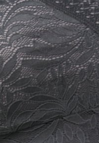Black lace fabric with floral and leaf patterns, featuring detailed mesh and embroidered textures.