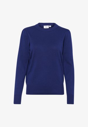 Tamsiai mėlynas megztas džemperis su apvalia apykakle, ilgomis rankovėmis, raštuotais rankogaliais ir apačia. Pasižymi lygiu paviršiumi ir minimalistiniu dizainu.