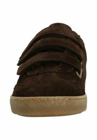 Brown suede shoe with three adjustable velcro straps, rounded toe, and a light rubber sole, featuring subtle stitching details.