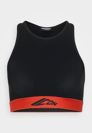 Black sports bra made of smooth material with a high neckline and wide armholes. Features a red elastic band with black logo accents.