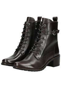 Stivaletti in pelle marrone con lacci, cerniera laterale, tacco spesso, texture liscia e dettaglio metallico circolare sulla cinghia alla caviglia.