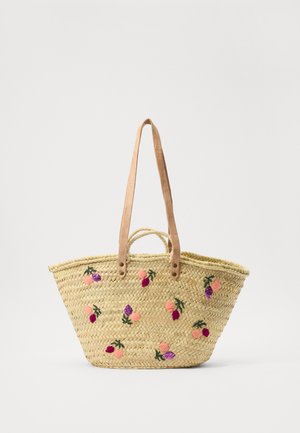 Sac en paille tissé avec des poignées en cuir, orné de broderies florales colorées en rose, violet et vert. Design ouvert.