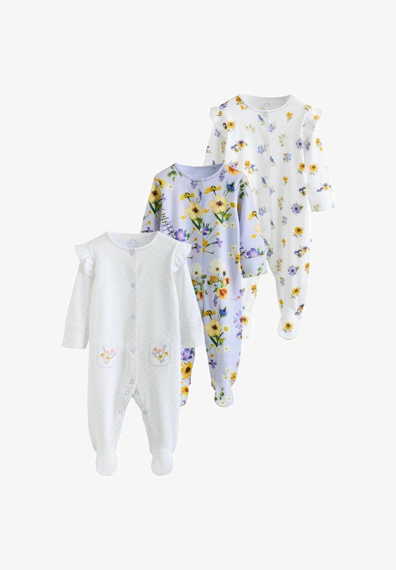 Trois grenouillères pour bébé à manches longues avec pieds et boutons-pression à l'avant ; une blanche avec de petites fleurs et des poches, une lavande avec des fleurs jaunes, et une blanche avec des imprimés floraux épars.