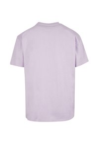 Kortærmet T-shirt i lys lavendel bomuld med rund hals og en afslappet pasform, præget af ensfarvet og glat tekstur.