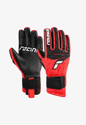 Schwarze und rote Torwarthandschuhe mit strukturiertem Handflächen, Netzrücken und einem Klettverschluss. Enthält Branding in Weiß am Handgelenk und an den Fingern.