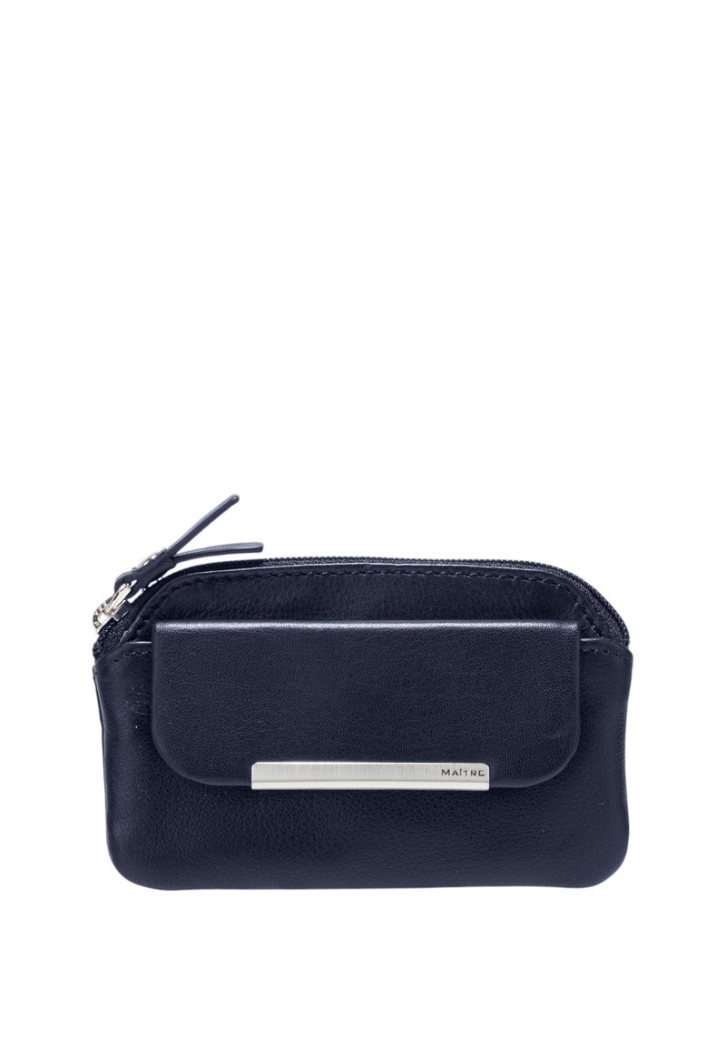 Mornarska usnjena torbica z zadrgo, sprednjim žepom in srebrnim kovinskim dodatkom. Gladka tekstura z rahlo zaobljeno obliko.