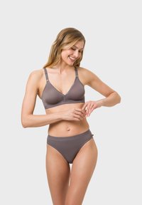 Gray seamless triangle bra with adjustable straps and matching bikini cut briefs. Soft material with a smooth texture and subtle branding.