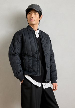 QUILTED JACKET - Lengva striukė - black