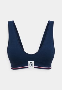 Navy blue bralette with a deep V-neck and wide straps, featuring a textured fabric and a logo patch with a crown on a contrasting band.