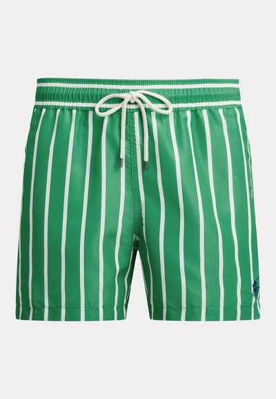 Πράσινο μαγιό με λευκές κάθετες ρίγες και λευκό κορδόνι στη λαστιχένια μέση, με μικρό ναυτικό λογότυπο στο πόδι.