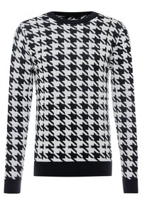 Černobílý svetr s vzorem houndstooth, žebrovanou texturou, kulatým výstřihem a dlouhými rukávy s pevným černým manžetou.