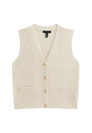Cramekleurige gebreide mouwloze cardigan met V-hals, vier gouden knopen aan de voorkant en twee kleine voorkruimels.
