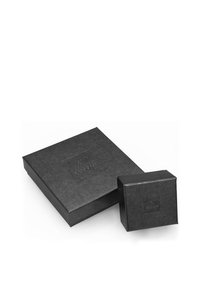 Black paper gift boxes, one large and one small, featuring embossed branding. Smooth texture and minimalist design.