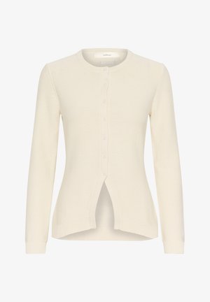 Krémový kardigán s okrúhlym výstrihom, predným zapínaním na gombíky, dlhými rukávmi a rozdeleným lemom. Vyrobený z textúrovaného pleteného materiálu.