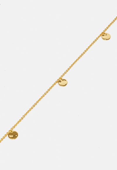 Gold chain necklace featuring round, polished discs with an irregular shape spaced along the length, on a plain white background.