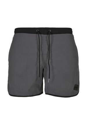 Costumi da bagno grigi realizzati in tessuto leggero, con vita regolabile in nero, tasche laterali e una piccola etichetta con logo sull'orlo.