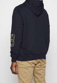 Mennace Jersey con capucha - blue