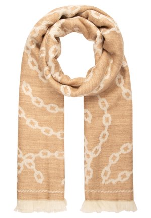 Beige gebreide sjaal met wit kettingpatroon en franjes aan de uiteinden, gevouwen in een lusvorm.